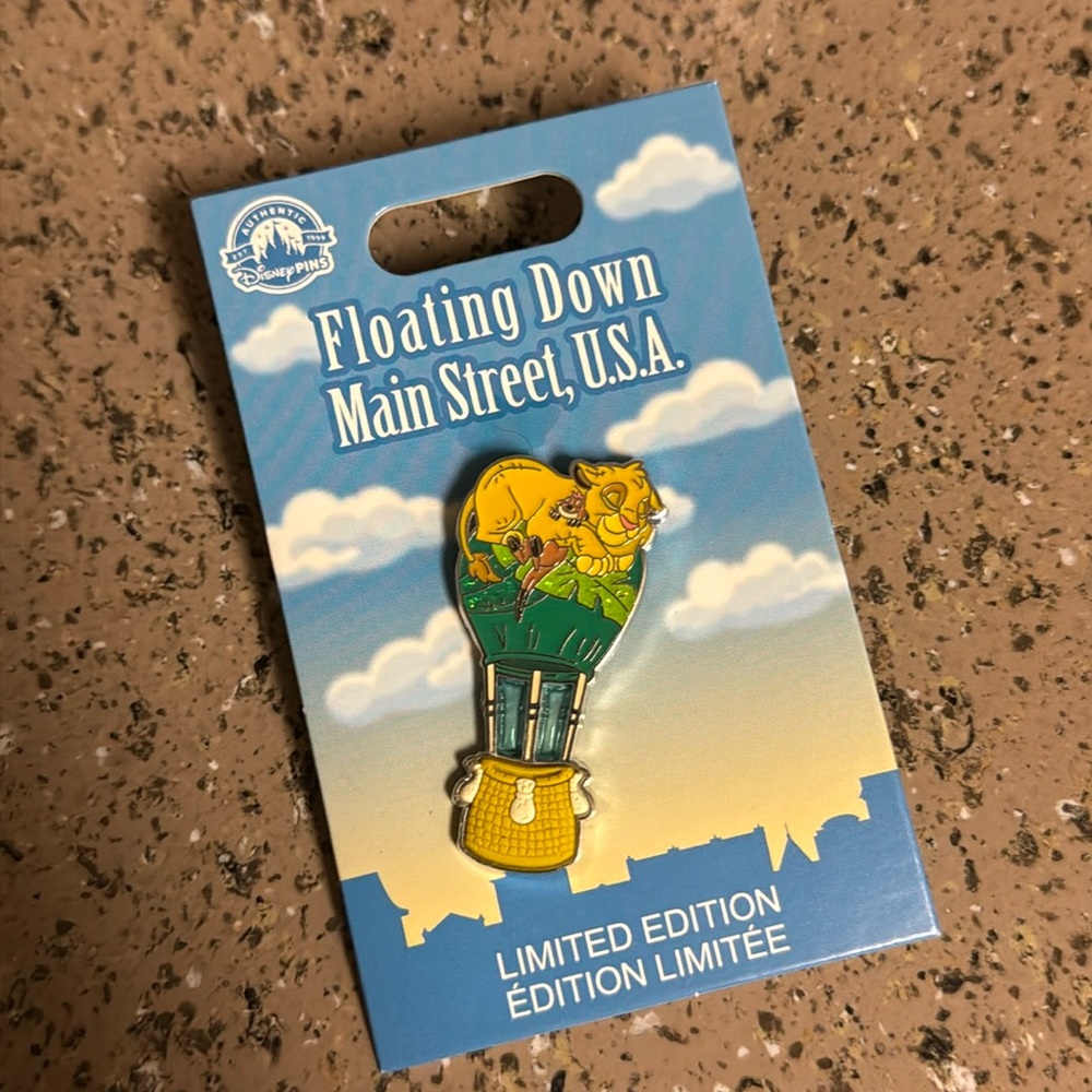 Disneyland Floating Down Main Street, USA Simba Pin